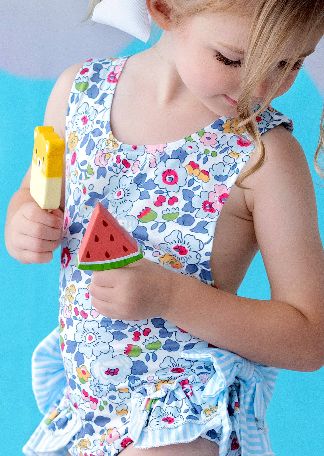 Toddler Girl Blue Floral Swimsuit – Ruffles, Bows & Open Back