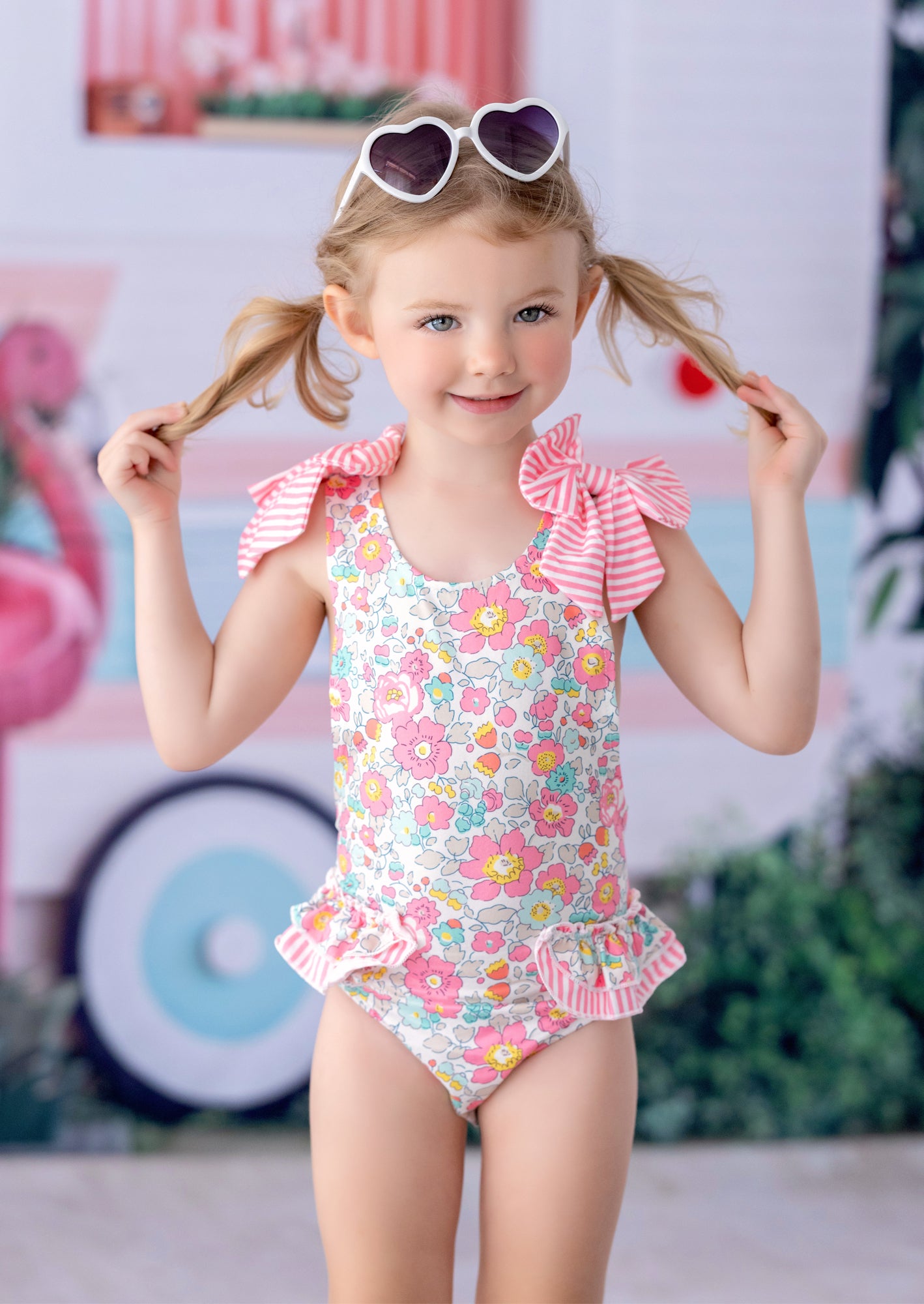 Toddler & Girls Pink Floral Swimsuit – Ruffles, Bows & Open Back