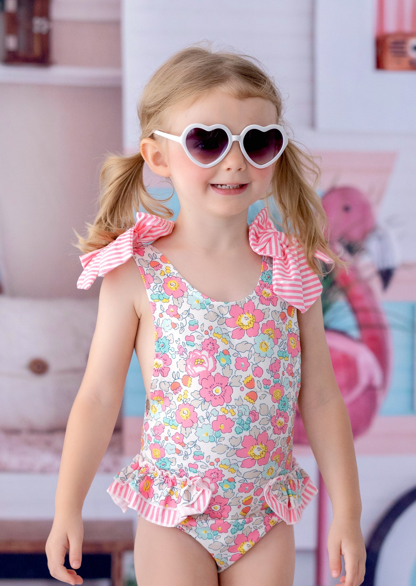 Toddler & Girls Pink Floral Swimsuit – Ruffles, Bows & Open Back